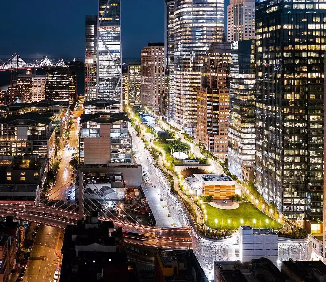 San Francisco's Salesforce Park lit up at night.